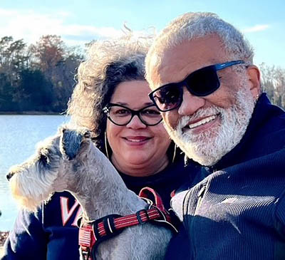 Wilbert Nelson Gilbert with his daughter, Tiffany Gilbert, and their dog, Happy.